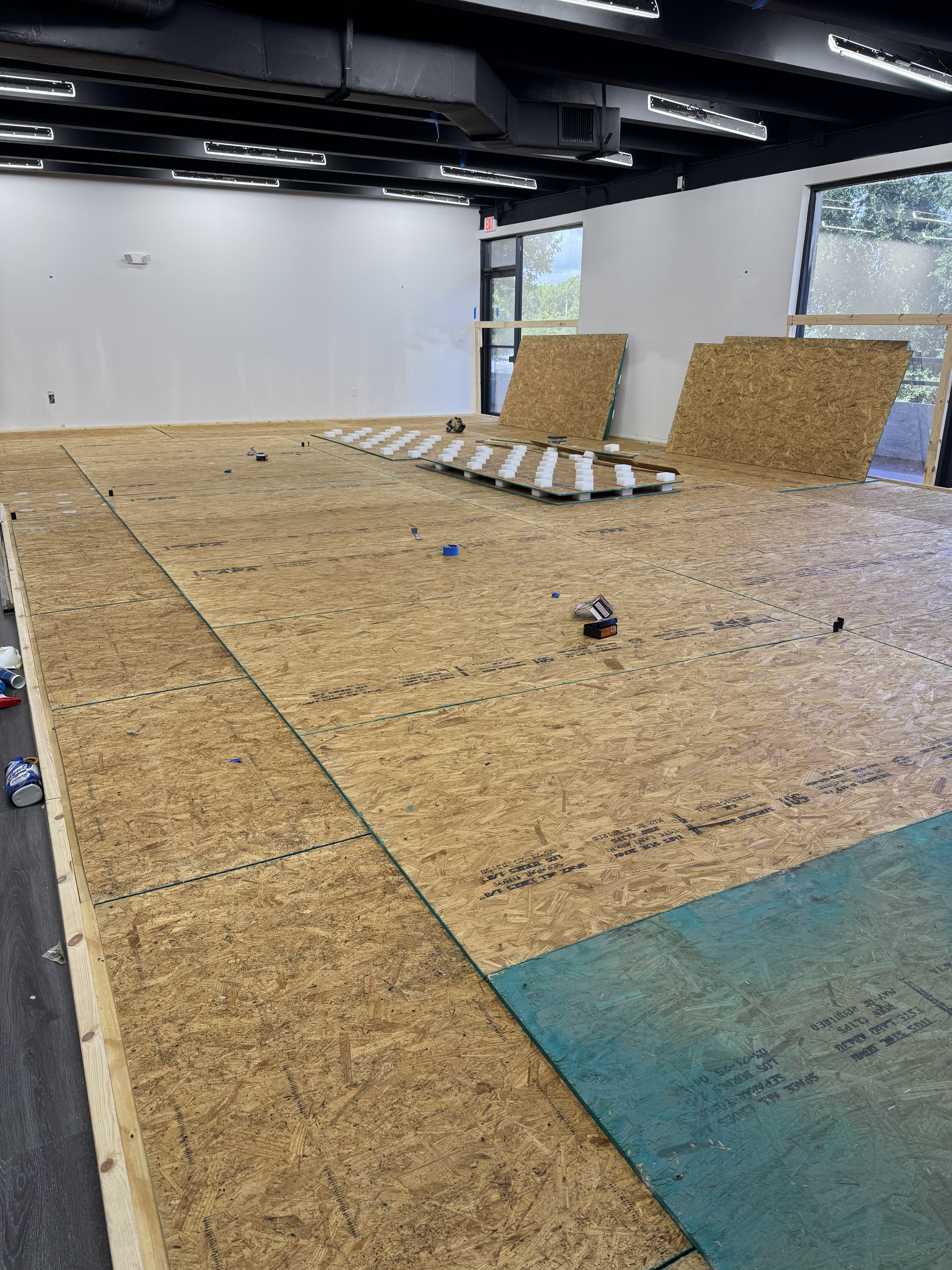 Completed subflooring system at Ground Game Theory